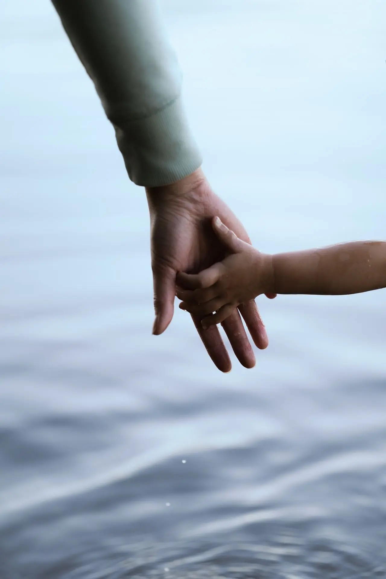 True Love A mother and her child hold hands