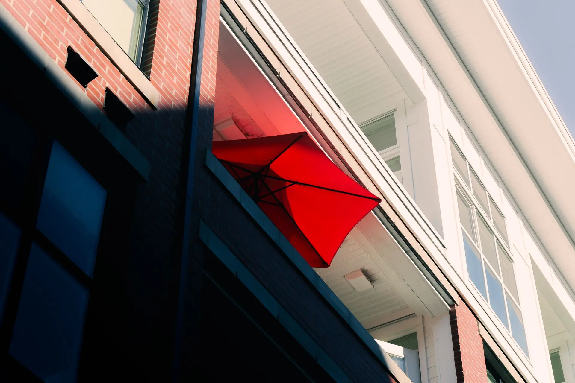 Umbrella 1 A red umbrella on a balcony