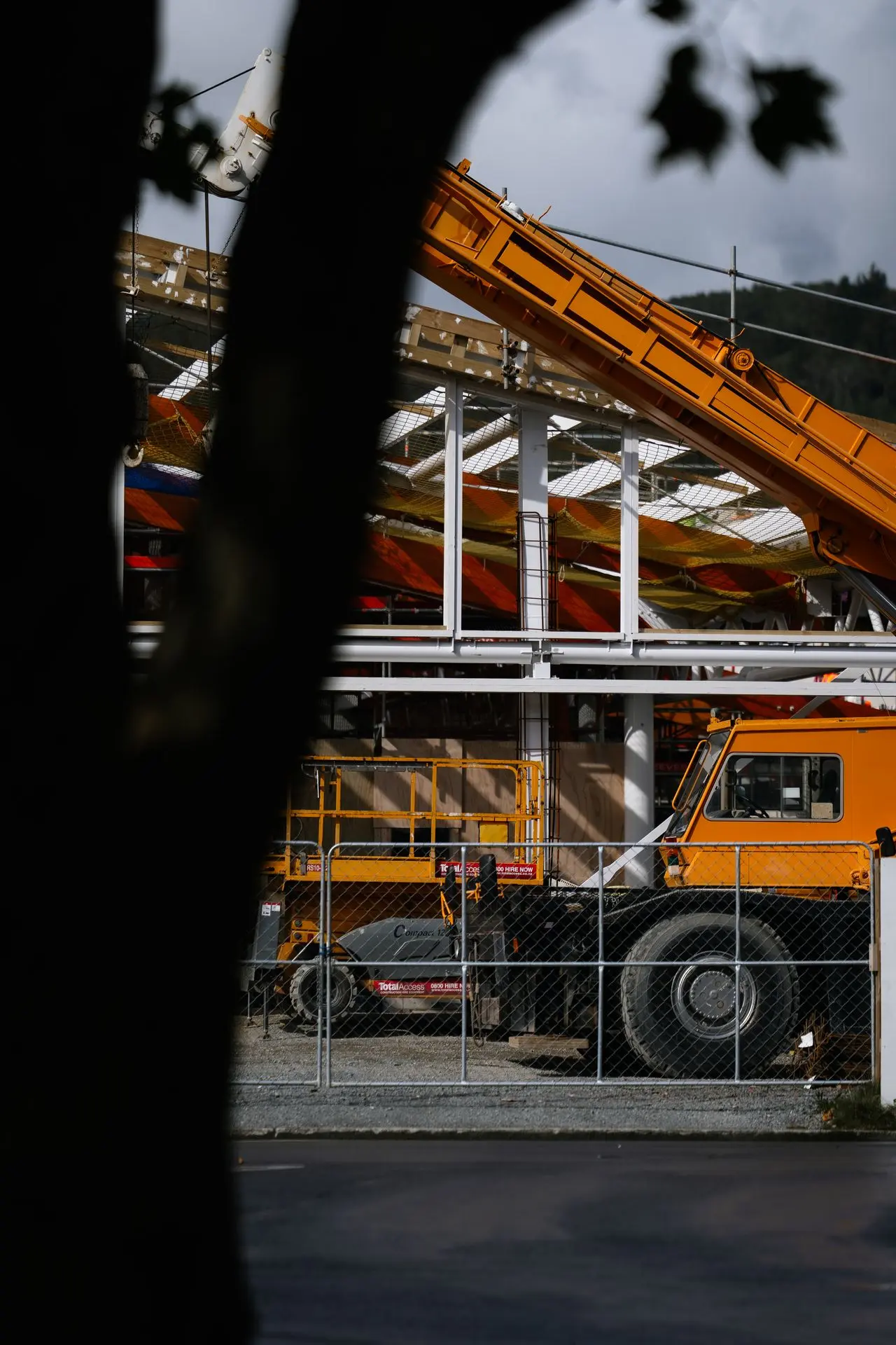 Industrial 2 A yellow crane in a construction zone